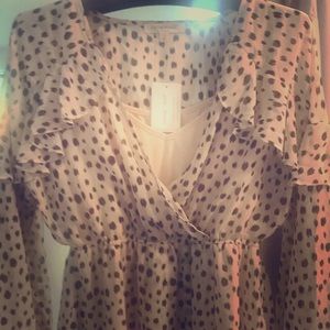 Vintage-inspired cream sees with black dots